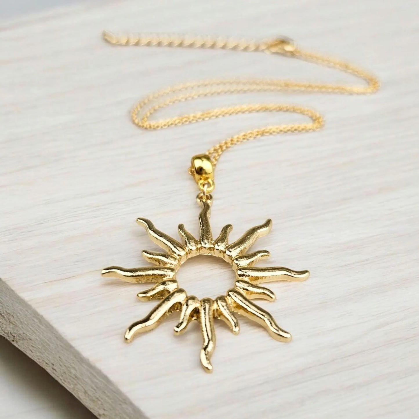 Gold Sunburst Charm Necklace
