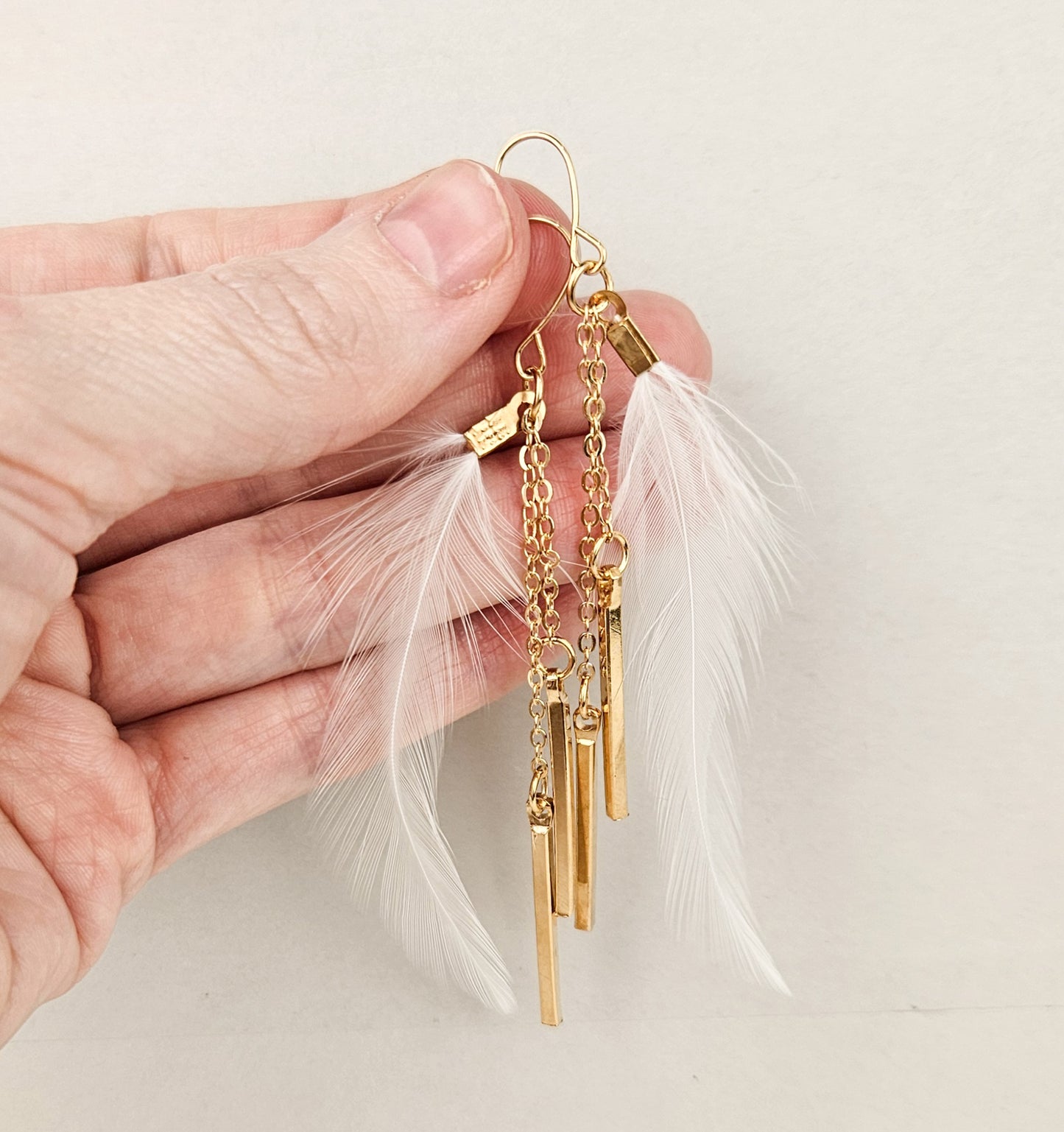 Gold Bar White Feather Dangle Earrings