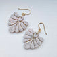 Pair of blush pink and ivory fan-shaped polymer clay earrings with gold details and gold ear wires.