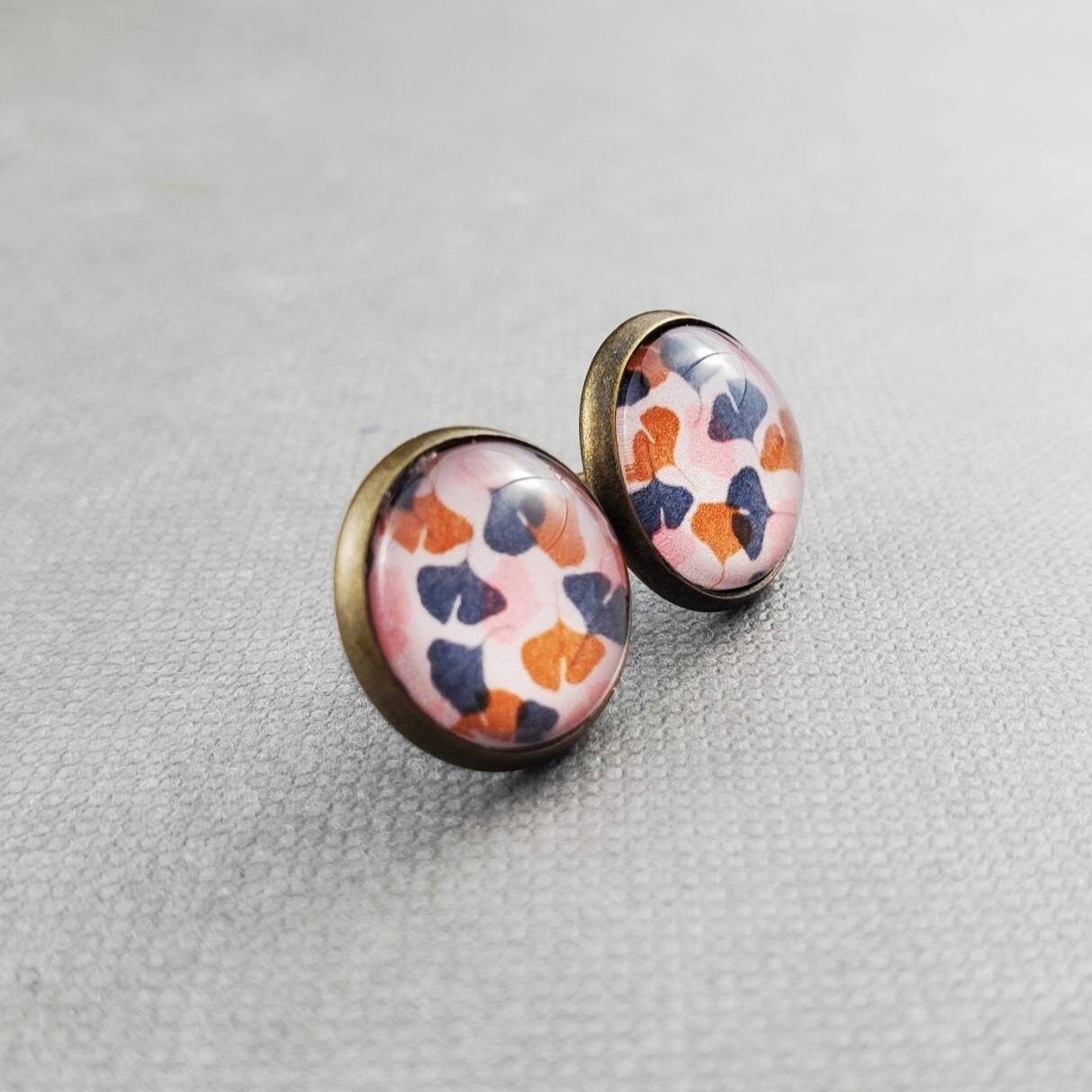 monstera and ginkgo leaf bronze stud glass earrings