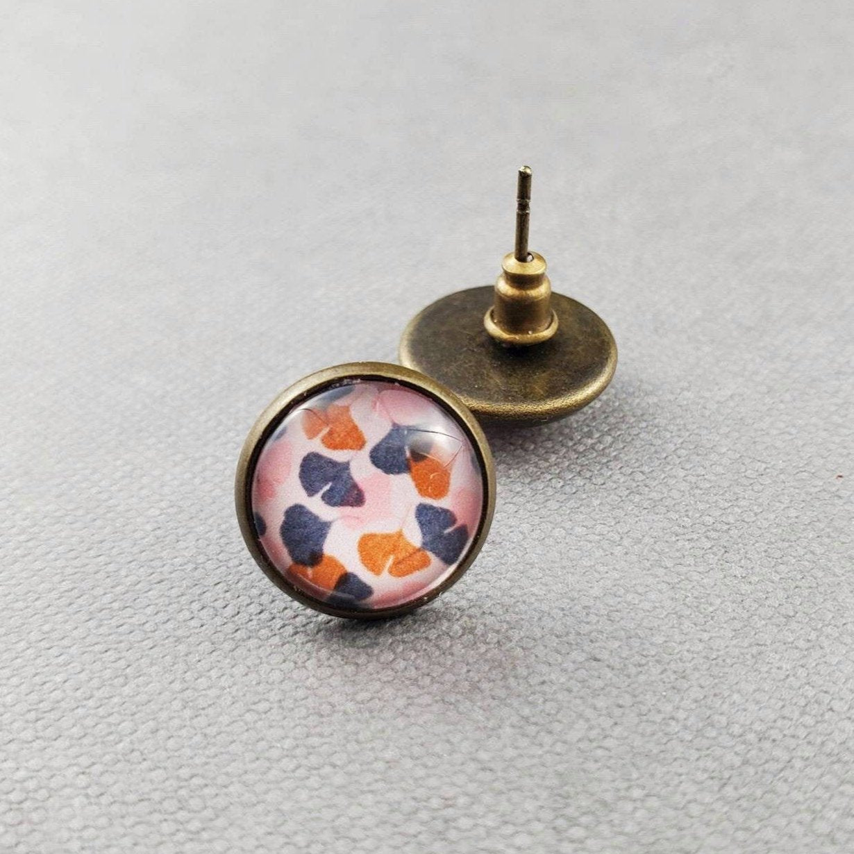 monstera and ginkgo leaf bronze stud glass earrings